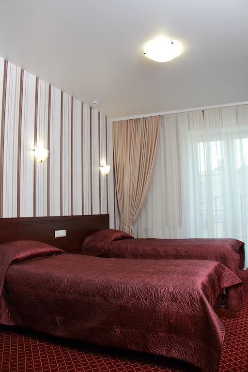 Hotel Aristokrat Poltava Habitación foto